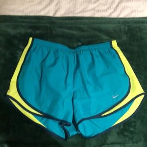 Nike teal and yellow dri fit shorts large